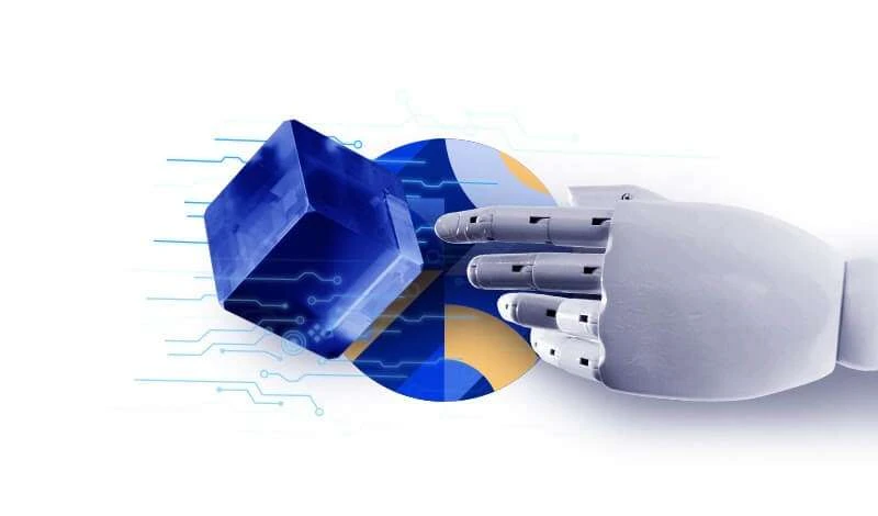 A robotic hand with a blue, cube-shaped digital object emerging from a background split with electronic circuit patterns and a blue and yellow geometric design.