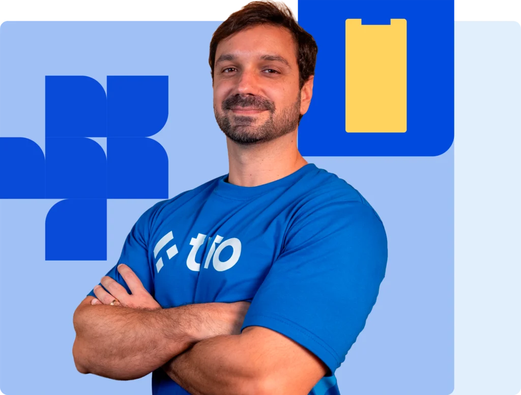 Trio mobile app development company — engineer in Trio t-shirt with mobile device graphic