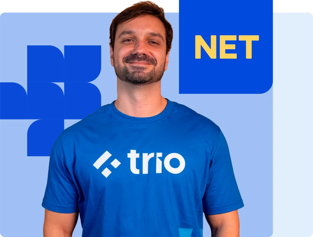 Trio NetSuite developer available for hire smiling in branded Trio t-shirt