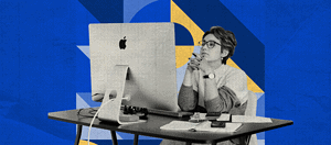 A monochromatic image of a person sitting at a desk with an iMac, hands clasped together in thought, amidst papers and a camera, against a backdrop of geometric shapes.