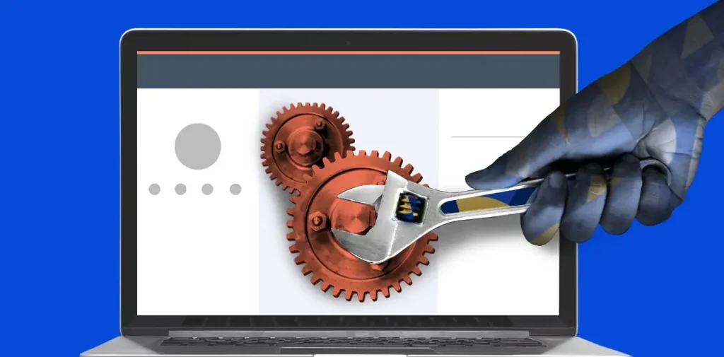 A laptop screen displaying a graphic of a hand with a wrench adjusting gears, symbolizing maintenance or troubleshooting of digital operations.
