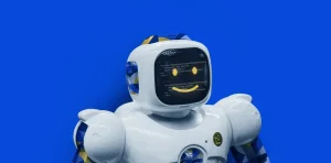 A white humanoid robot with a head screen displaying code, standing against a blue background with digital elements representing the best languages for AI development.