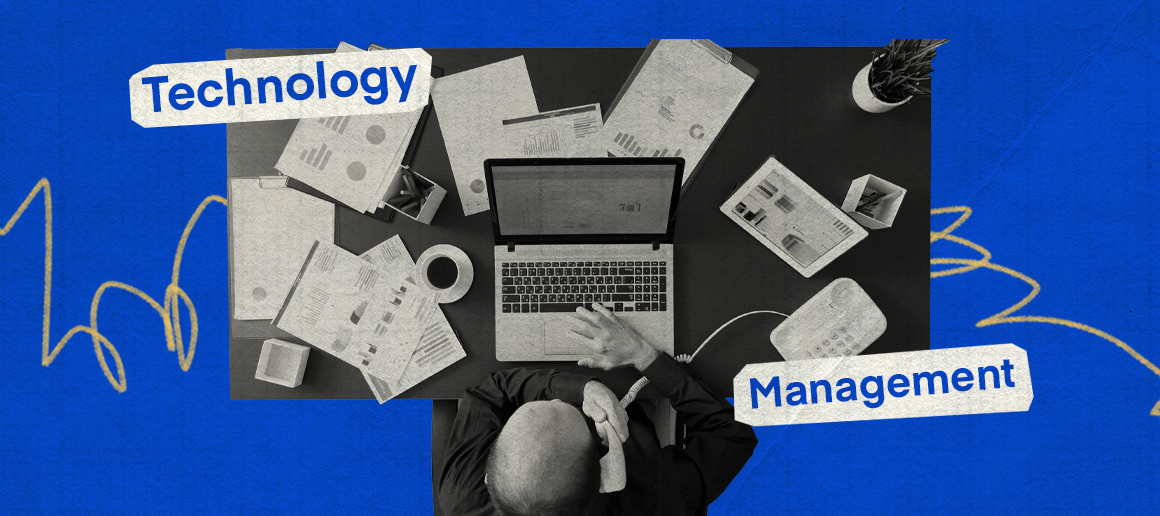 Overhead view of a workspace with 'Technology' and 'Management' text, illustrating the fusion of tech and leadership.