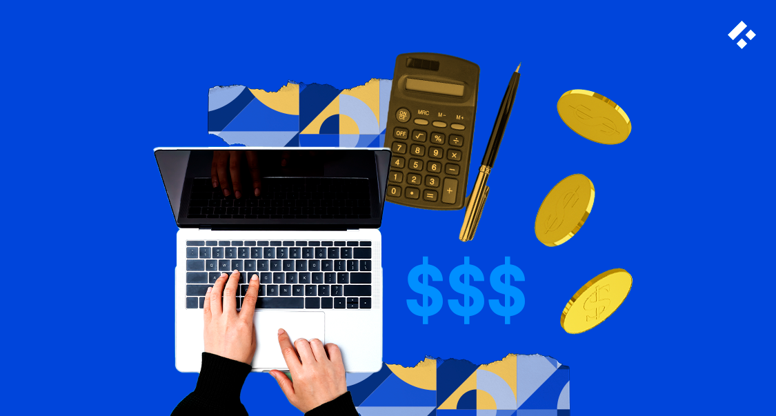 A top-down view of a laptop with hands typing, a calculator, coins, and dollar symbols.