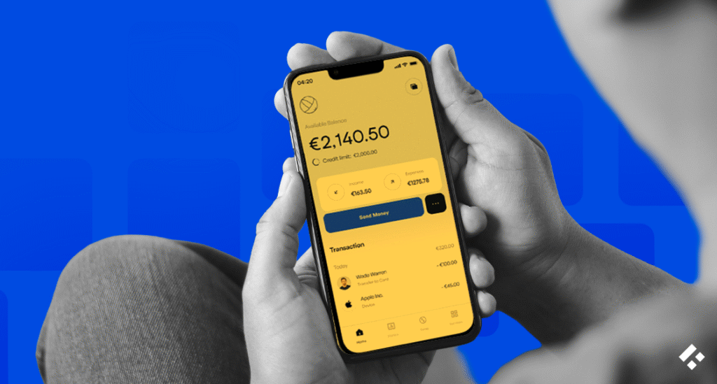 Close-up of a smartphone displaying a mobile banking app with balance and transaction details.